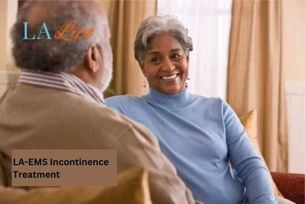 Couple sat smiling at each other - LA-EMS treatment Selly Oak
