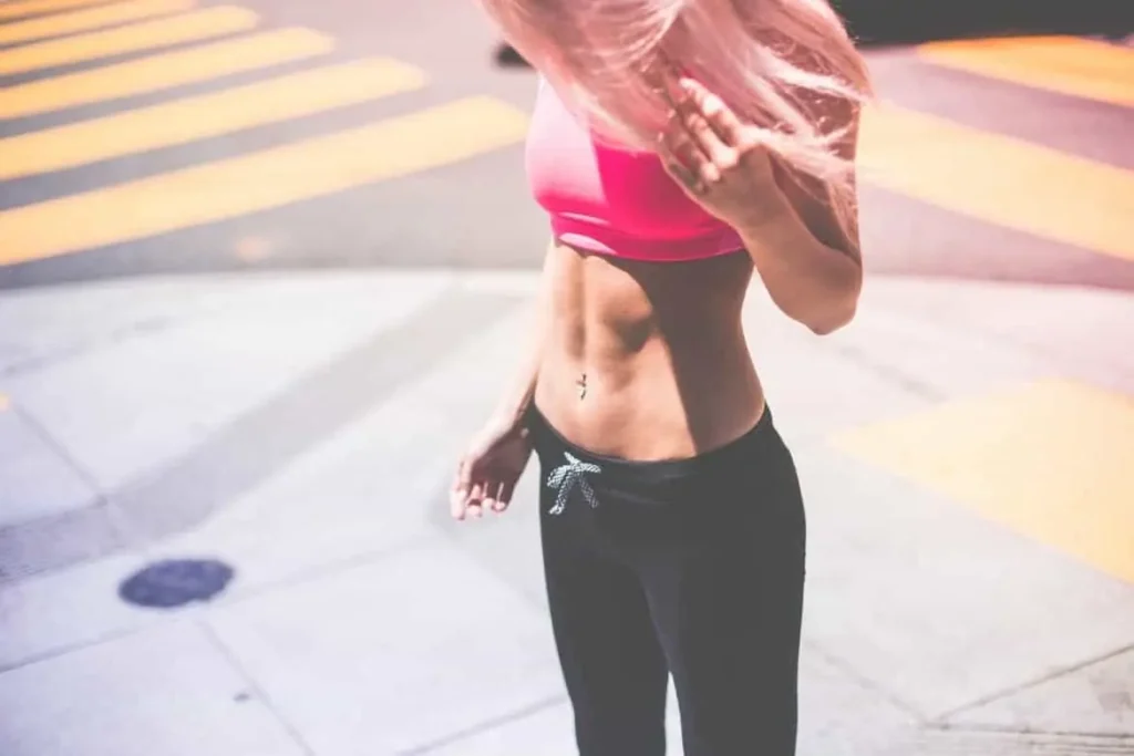Woman with toned stomach after LA-EMS Body Sculpting Treatment Selly Oak 